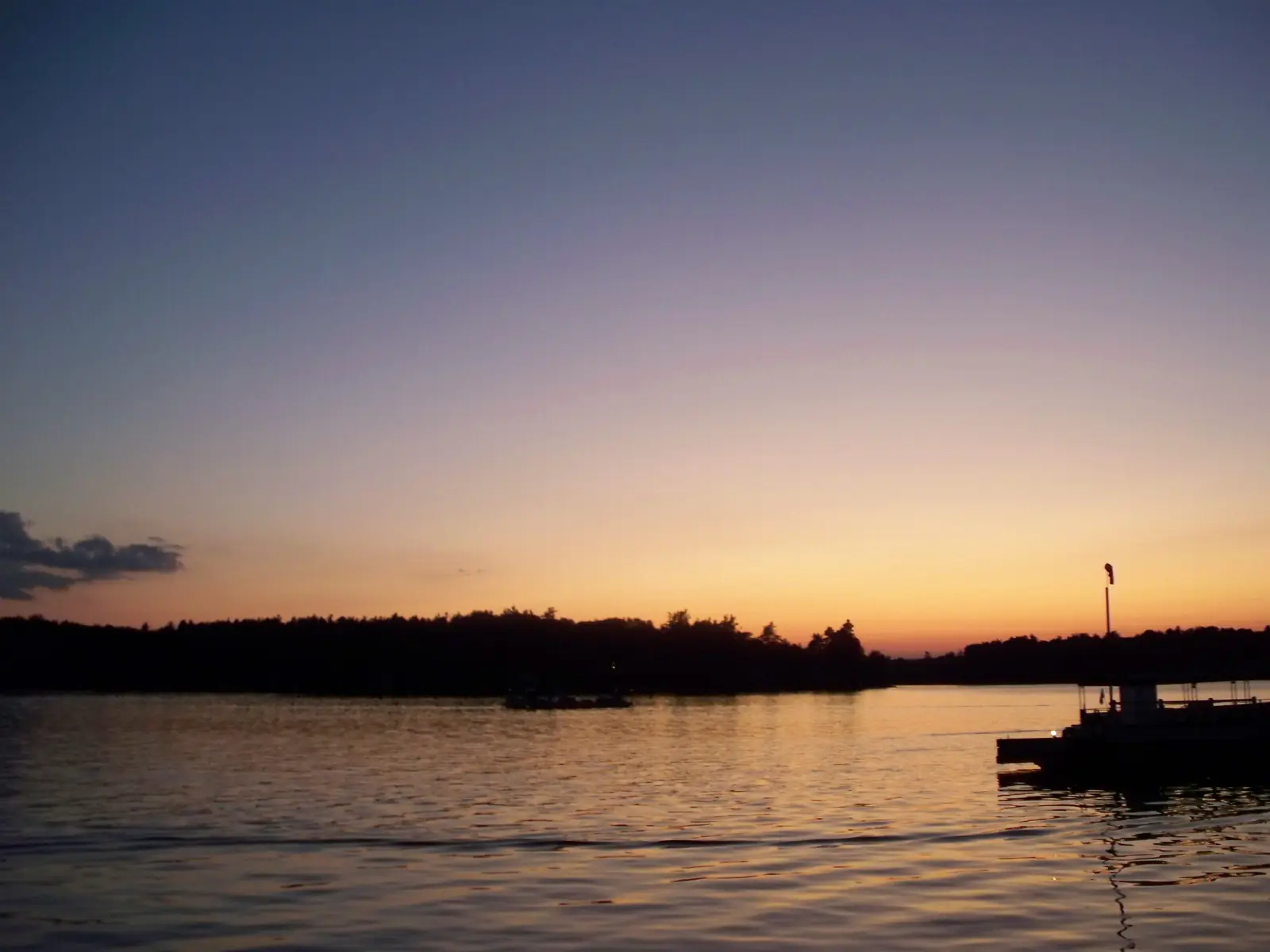 Canobie Lake at dusk, seen from the Canobie Lake Park shore in Salem, New Hampshire