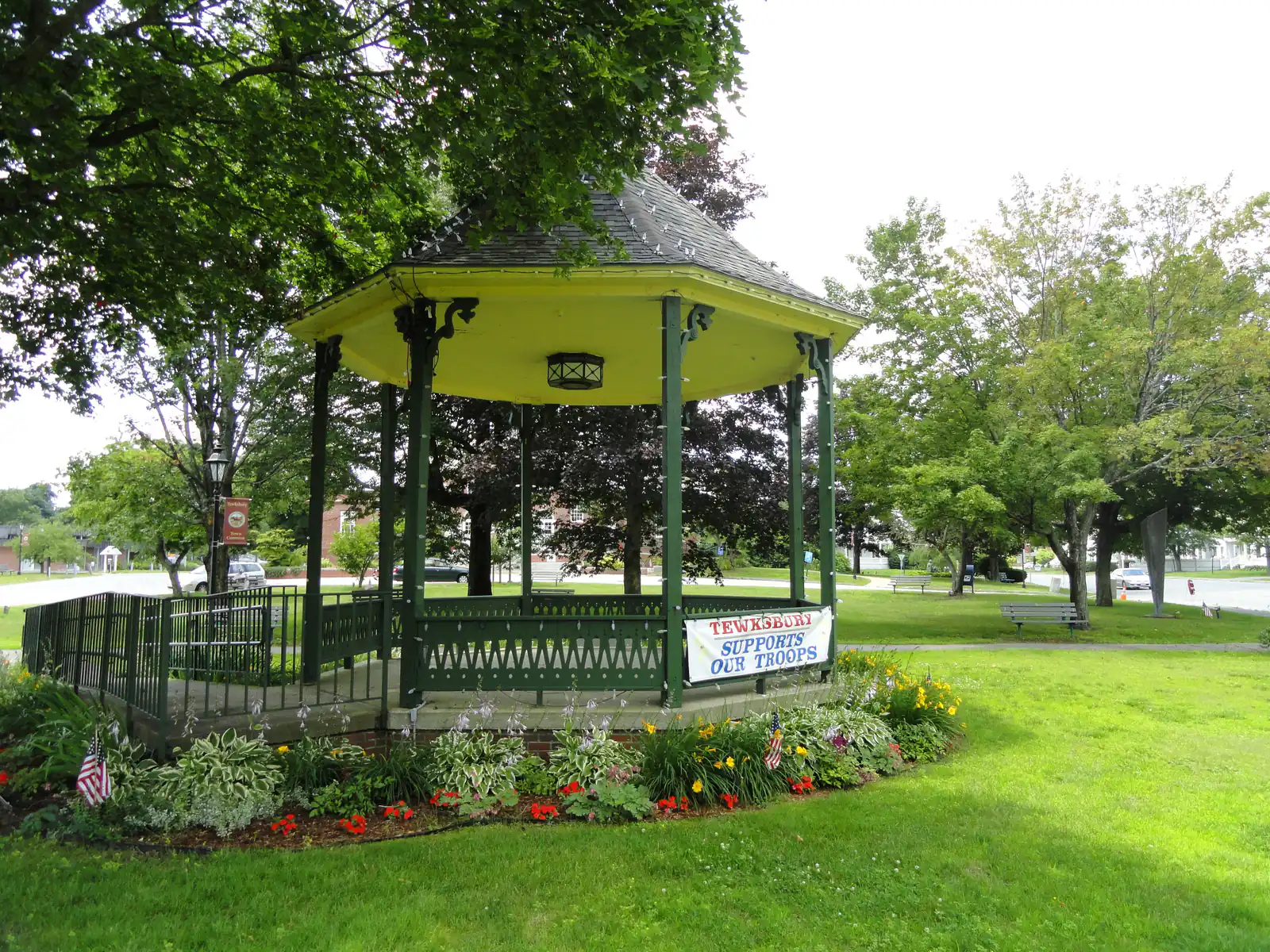 The bandstand on the Town Common in Tewksbury, Massachusetts, surrounded by summer trees